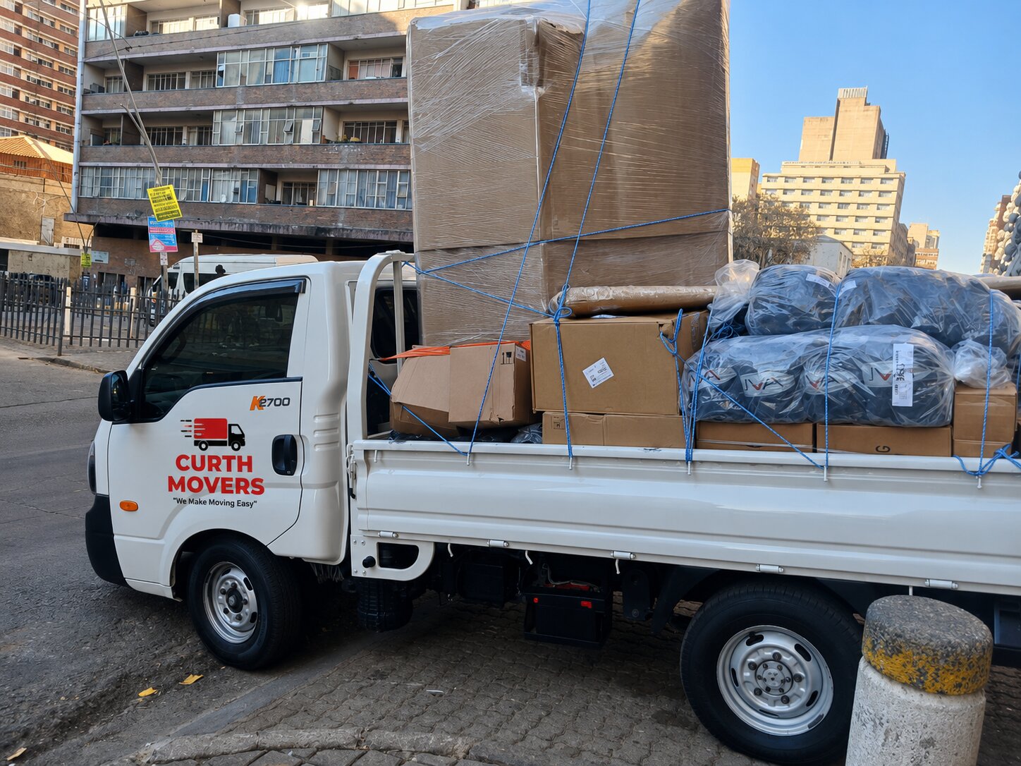 Loaded Curth Movers truck on the road