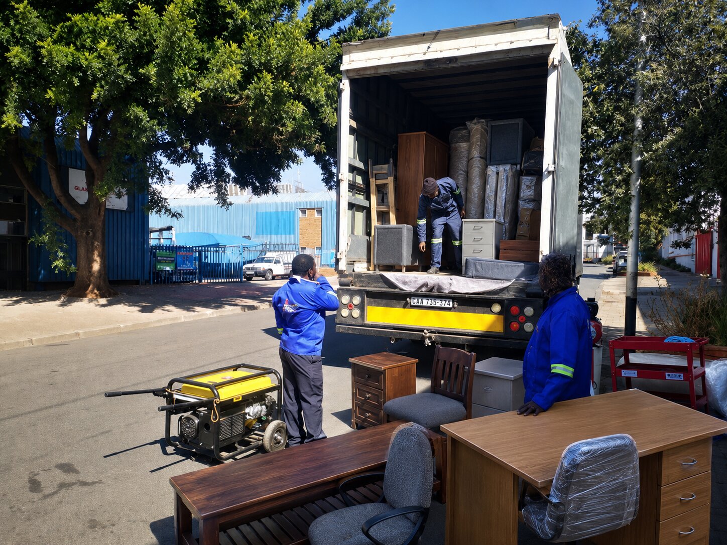 Crew loading a large moving truck